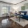a living room with a blue couch